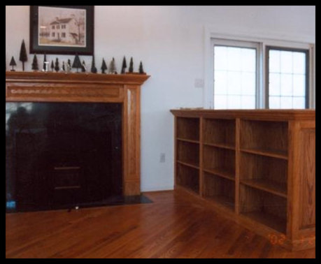 Custom 3-foot red oak built-in with pilaster details and a coordinating tabletop designed to match an existing fireplace mantle.